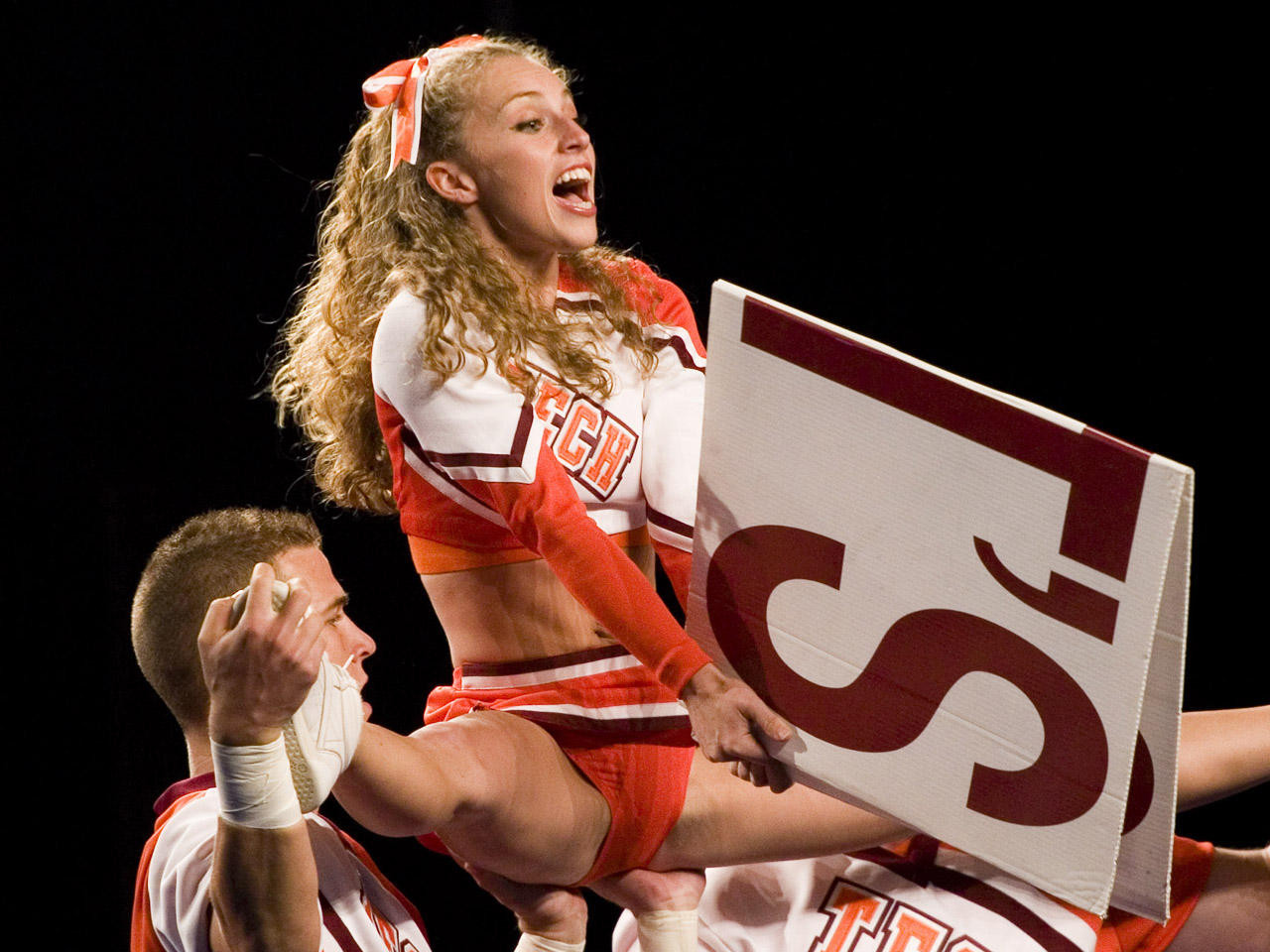 Experience the thrill of the upskirt cheerleaders in these racy photos